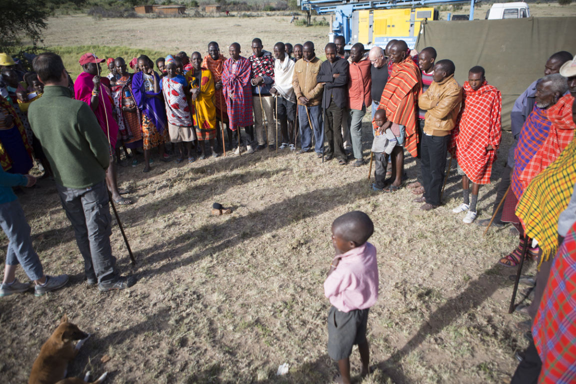 Drilling a fresh water well at Ilturisho Kenya starts with prayer.