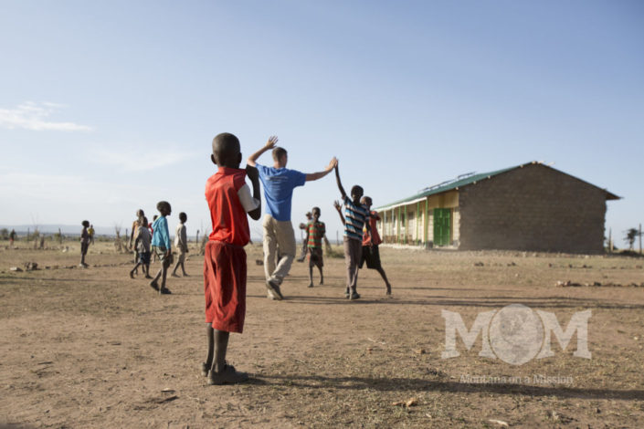 Playing football with the students at Saaten primary school, the site of a Montana on a Mission pipeline providing clean water to the children and their families.