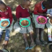 The new Kenya school year began two weeks ago and we are sharing in the excitement of the new Montana on a Mission school lunch program at the Lower Oloosekin school. The students are served a lunch of either maize and beans or rice and beans throughout the week with the addition of vegetables. Usually tomatoes, carrots, onions, potatoes, and greens. The students’ parents have come together to pay a mother to cook and clean up. ❤️Currently, the cost is about 50 cents per student per day. We will be reassessing and making any necessary adjustments to the quantity of food needed at the end of each month. We also expect the enrollment to rise as news reaches other families that their children can receive a hot, nutritious meal each day at school. Enrollment was about 35 students before we drilled the clean water well there in late 2020 and now is near 60 students. Over the past year we built a new building with two additional classrooms, latrines, hand washing stations and desks for the teachers and students. We were also able to help provide the government required curriculum. The school currently includes preschool through grade 2. Most of these schools add a grade per year as students advance.